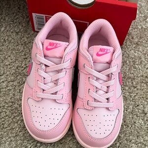 Brand new pink dunk low girls Nike tennis shoes.